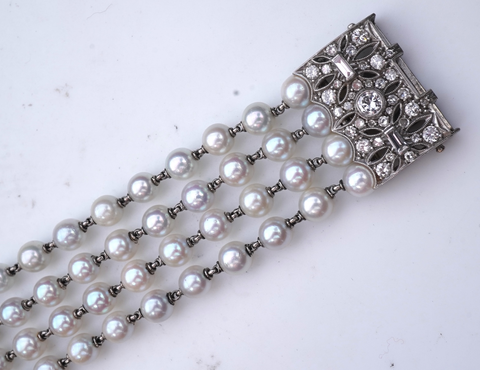 A cultured pearl and diamond bracelet